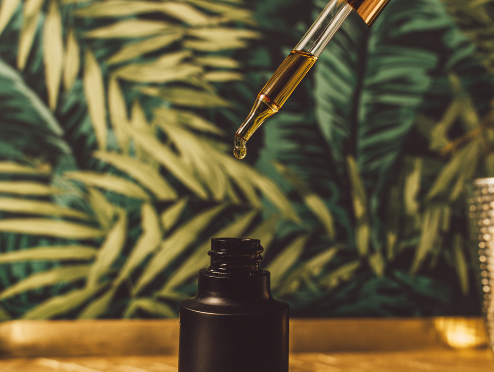 Dropper removing oil from a bottle