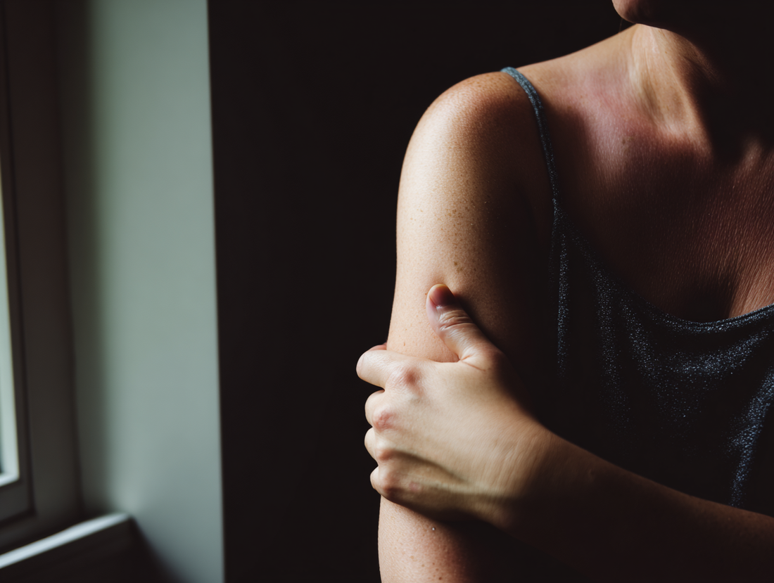 Woman's shoulder in sunlight showing smooth skin