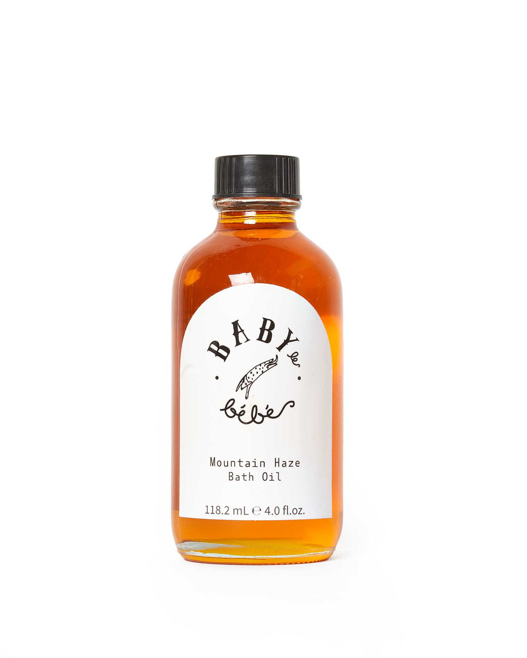 A bottle of 'Mountain Haze Bath Oil' with a label that reads 'BABY le bebe. The liquid appears translucent and is set against a white background.